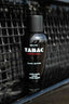Produktbild Tabac Original Black Edition After Shave Lotion vor dunklem Hintergrund